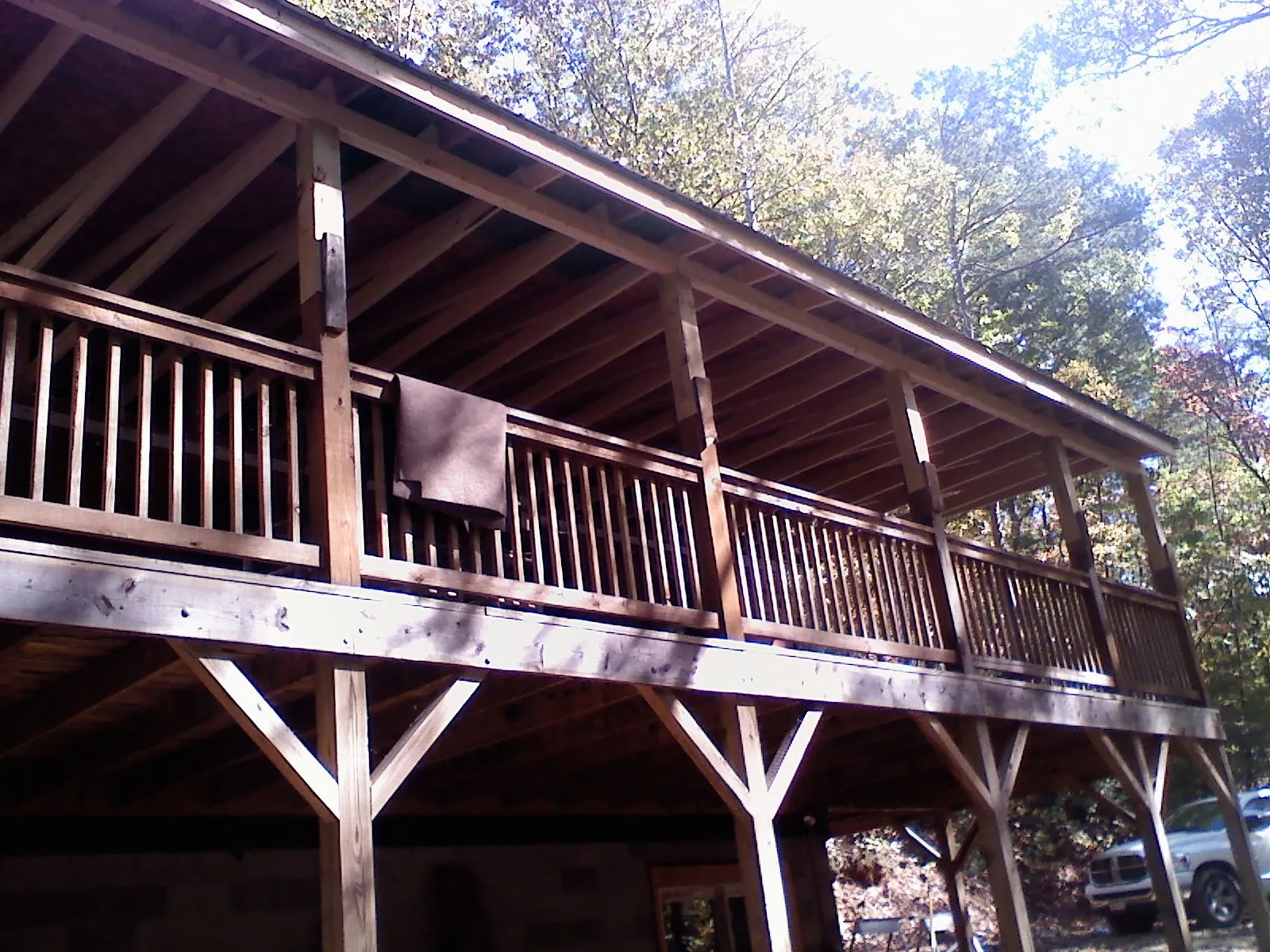 Timber framing under a new elevated porch and deck — Roof Leak Repair in Gifford by Roofing Brothers